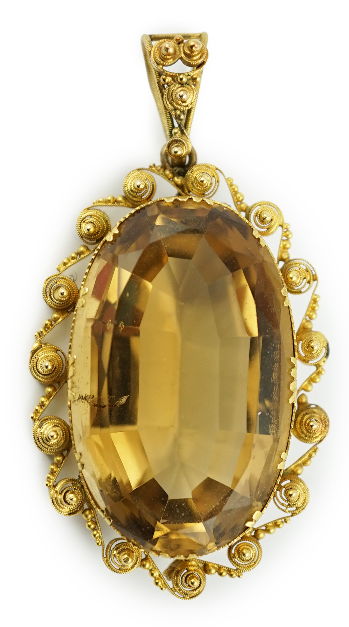 A Victorian style gold and oval cut citrine set pendant